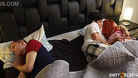 Redhead petite pussy fingered then fucked beside sleeping man