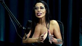 damn this naughty babe strips showing massive tits on sheer red?