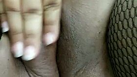 beruka's horny shaved pussy drips through open fishnets