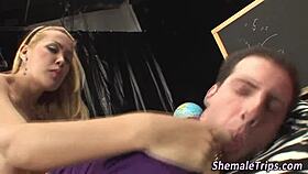 a blonde tgirl poses seductively in sheer stockings video.