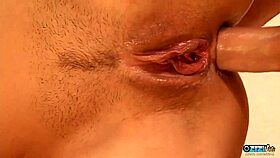 blonde's tight asshole stretches wide around huge cock as she rides happy in closeup