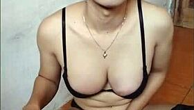 Watch this young shemale stroke her big cock solo till she cums hard