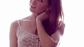 janna strips revealing her perky tits and plays intimately