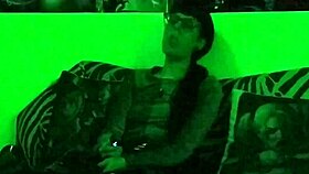 Beth's Kinky Goth Domina Smokes Hot in Green Light!