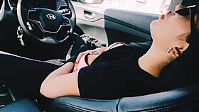 SHE FINGERS HER ATHLETIC PUSSY IN THE CAR HORNY AND DESPERATE FOR RELEASE