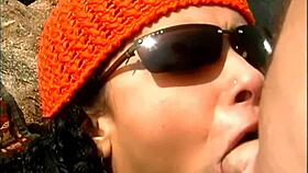 😏 Mature dude pounds exotic babe in cap and shades on seaside rocks cowgirl style 👙🌊