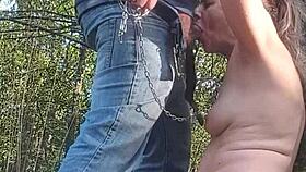 European slave flashes tits in forest for bent over humiliation and cum