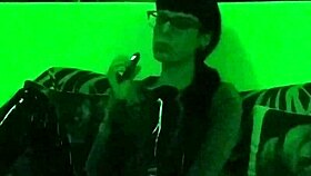 Beth's Kinky Goth Domina Smokes Hot in Green Light!