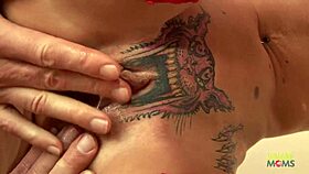 Skinny blonde with tattooed pussy takes creampie on red couch