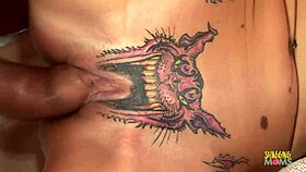 Skinny blonde with tattooed pussy takes creampie on red couch