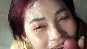 Cum-covered cutie begs you to watch her smear it thick over her pretty face and lips