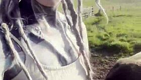 Happy Hippie Country Girl Chats With Cows