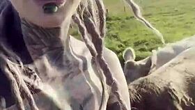 Happy Hippie Country Girl Chats With Cows