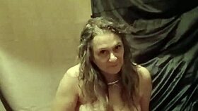 French milf slave strips teases spanks pussy in outdoor humiliation session