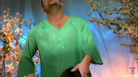 A sexy brunette meets a ripped tattooed guy in a dreamy forest setting.