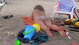 beach babe eyes huge cocks and fingers her wet pussy till she cums hard!