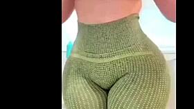 her huge latina booty shakes wildly as she strips teasingly