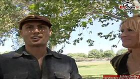 Skinny blonde with fake big tits rides monster cock right in front of watching cuckold