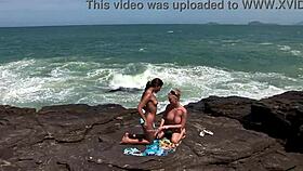 Two bisexual brazilians with pierced nipples lick pussies on voyeur beach