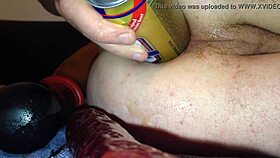 Beer bottle plunges into tight dildo assfucking