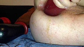 Beer bottle plunges into tight dildo assfucking