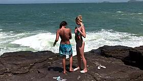 Two bisexual brazilians with pierced nipples lick pussies on voyeur beach