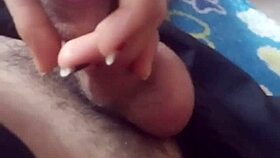 Curvy latina strokes off her best friend's cock while watching movies