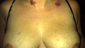 I tease him with dirty texts while others watch my big tits