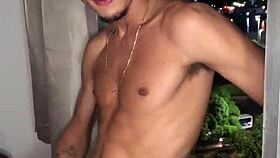 Safado boy jerks huge load handjob style at building window view