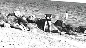 Huge cocks swing free on nudist beach voyeur style