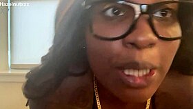 ebony hazelnutxxx lights up cigarette posing seductively in tight bikini close-up