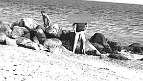 Huge cocks swing free on nudist beach voyeur style