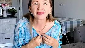 busty mature in lingerie teases her shaved pussy close up