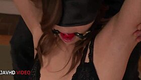 Exhausted Asian teen rests after intense session and bondage play