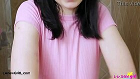 A dark-haired beauty steps into the steamy shower for a refreshing rinse