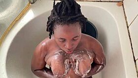 Two bisexual ebony lesbians share massive black cock in wild pee play threesome