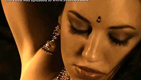 exotic indian babe dances nude by the fire stripping sensually