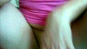 Sophie teases in jeans miniskirt and red lingerie before fingering her wet pussy on webcam