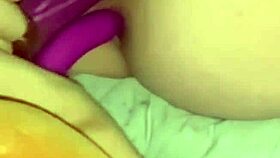 watch her shove that giant vibrator and anal dildo deep—makes her gag hard before finally cumming