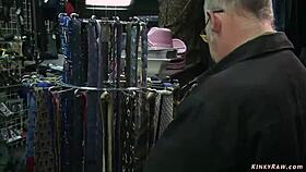 bound slave humiliated and fucked hard in public boutique by dominant group