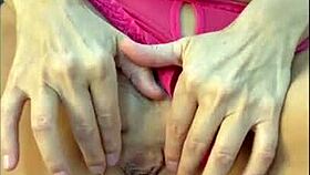 Mature lady enjoys intense fisting and fingering close-up