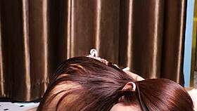 Why does petite Asian slut suck dildo before footjob tease?