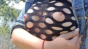 Hot teen spreads wet pussy outdoors solo