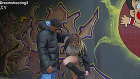 german woman surprised on barcelona street with dark partner