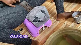 Ebony wife teases cuck hubby in lingerie foot play