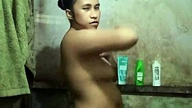 heart racing indonesian housewife bares big tits and pussy in steamy naked bath