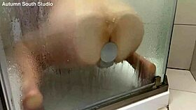 Autumn South fucks wet pussy with dildo in steamy shower solo
