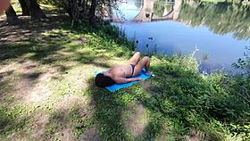 stranger surprises milf with hairy pussy massage on crowded beach