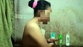 heart racing indonesian housewife bares big tits and pussy in steamy naked bath