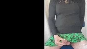 Crossdressing sissy feels so excited dressed in fishnets heels playing with cock exploding huge cumshot